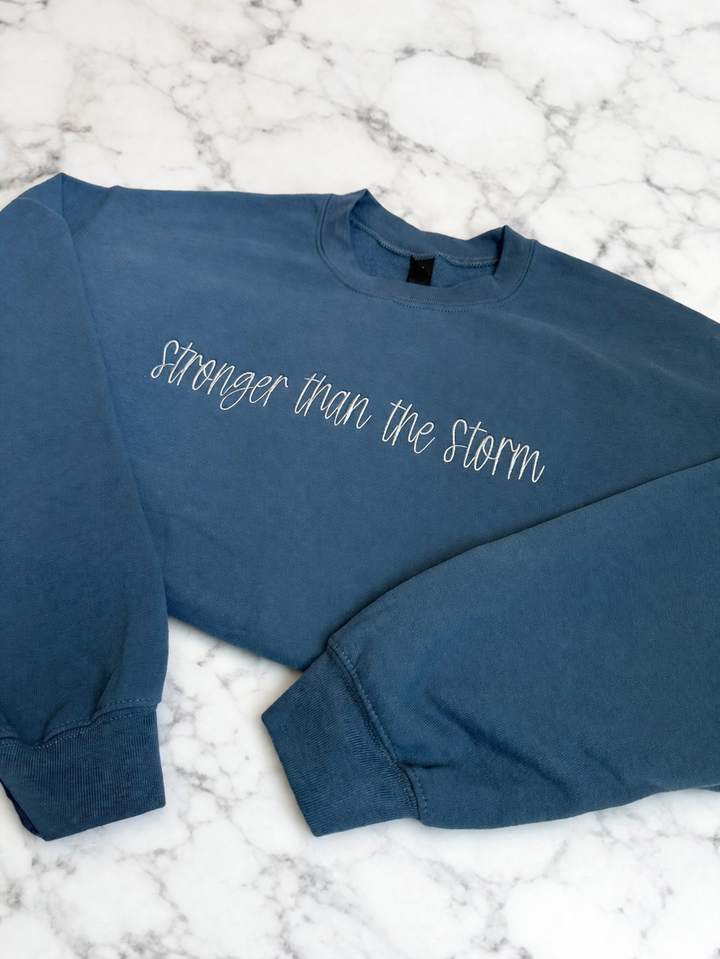 Stronger Than The Storm Crewneck