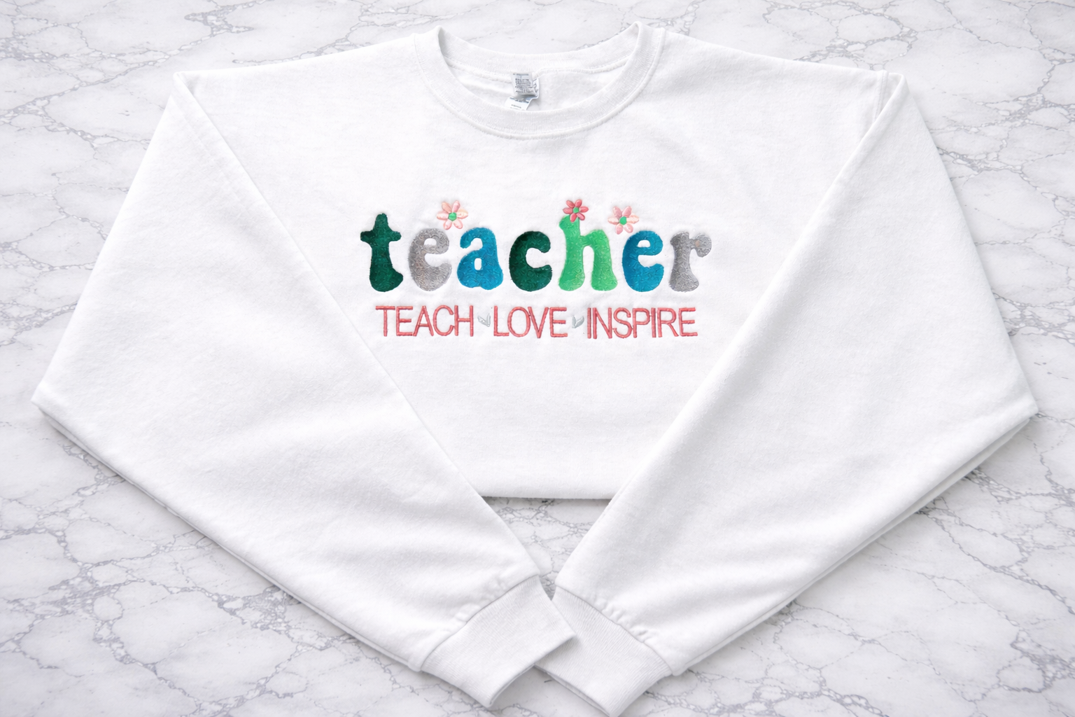 Teach Love Inspire Crewneck