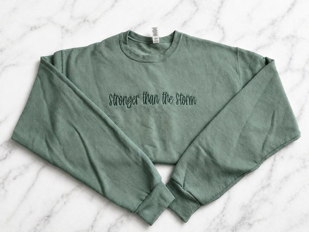 Stronger Than The Storm Crewneck