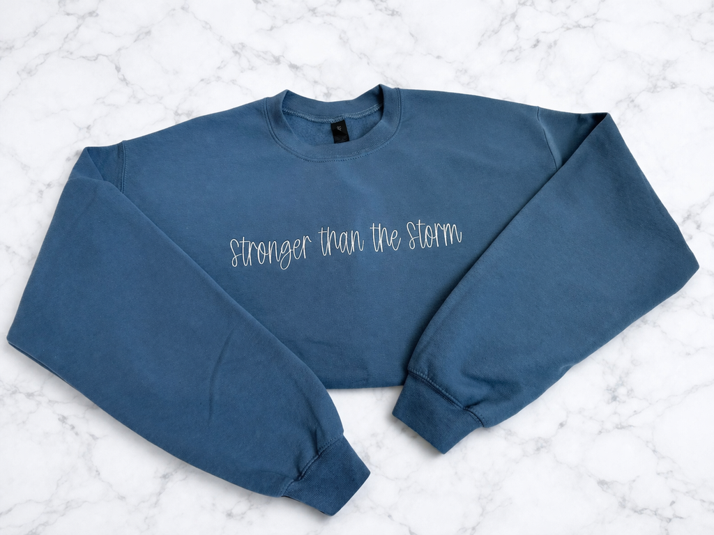 Stronger Than The Storm Crewneck